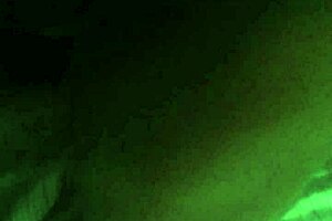 Mature woman fingers pussy and gives blowjob on phone.