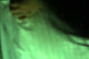 Mature woman fingers pussy and gives blowjob on phone.