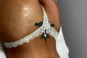 Tattooed MILF enjoys massage and play