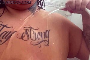 Mary Jhuana tests the shower while bathing