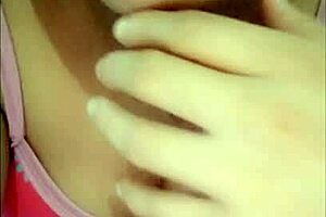 a mature woman with impressive big tits enjoys a relaxing session