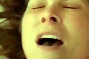 Busty brunette milf sucks monster dildo while masturbating. Is she a slut or just playful?