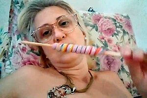 stella still sucks on a delicious lollipop in this fun video