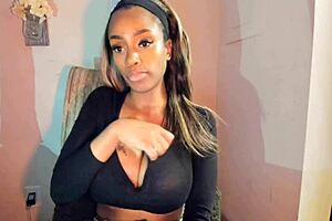 Tattooed milf with big tits teases her pussy in a steamy solo session