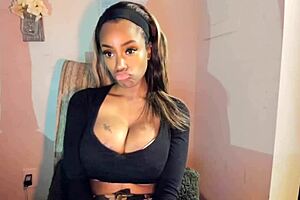 Tattooed milf with big tits teases her pussy in a steamy solo session