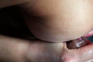 i jerk him off by playing with my tits to cover them with cum