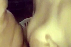 Silicone-enhanced beauty in explicit video