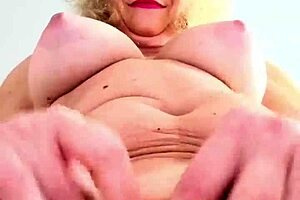 Mature lady enjoys her break at work.