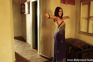 Well-endowed mature lady just strips and dances lewd before the camera in a homemade video