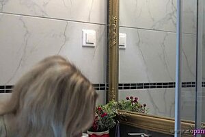 Big-breasted brunet Milf strips off her knickers in the lavatory