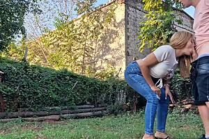 A latina independent adult gives head in a country lane