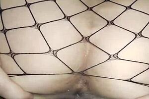 milf wife in fishnet outfit experiences stretching in the scene