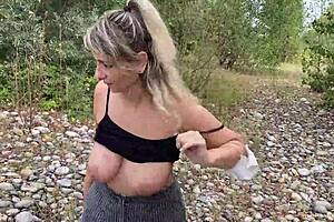 Busty milf gets hardcore fucked outdoors by the river, almost caught