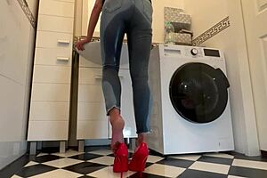German housewife in sexy red heels gets wet solo