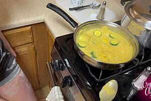 Stepmother gives a deepthroat blowjob while cooking