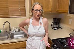 Stepmother gives a deepthroat blowjob while cooking