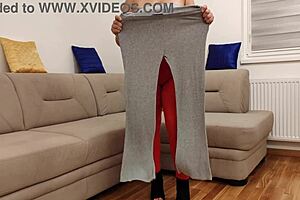 female slave in bdsm session with harness and fellation