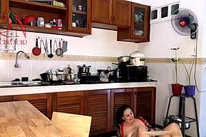 Naked housewife's kitchen solo turns into a steamy affair