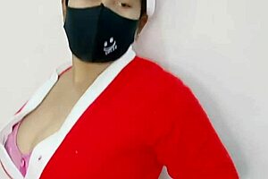Amateur video of a pregnant woman in her prime, Christmas-themed