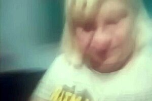 The big milf wife shows off her huge tits in the story.