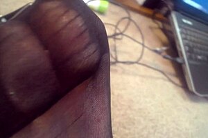 Sheer pantyhose on older woman