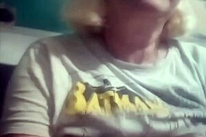 The big milf wife shows off her huge tits in the story.