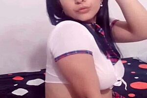 Beautiful schoolgirl shows big ass and voluptuous vagina.