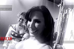 Lesley Zen and Carly Parker in a group sex scene with a big cock
