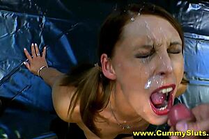 A young brunette gets a facial after being fucked by a mature woman