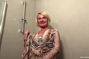 blonde cougar goes wild with natural tits