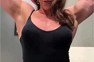 Femdom and bodybuilder in a steamy scene with a mature MILF