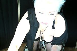 Dirty talking stepmother shows her big pussy on webcam