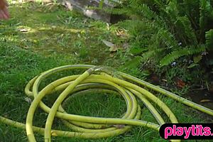 Swiss MILF undresses in garden