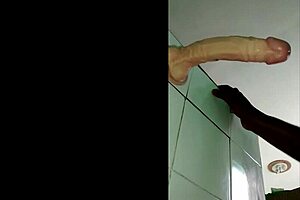 African mom enjoys playing with her toy in videos Part 14