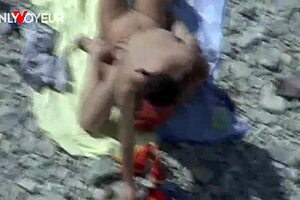 Tanned MILF gets a passionate beach encounter with a stud