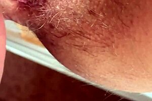 Close up and slow motion of a hairy pussy being fucked by a big cock