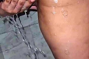 A mature woman showers and enjoys herself