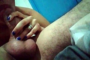 milf gives a good blowjob to her lover in the bedroom with passion