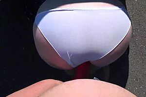 Outdoor strap-on action with MILFs