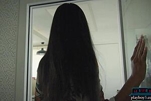 harley dean, ebony model, poses in studio for playboy