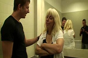 A blonde MILF’s scandalous affair in a public mall bathroom