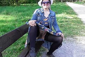 Cross dressing mature shows off hairy beaver in public