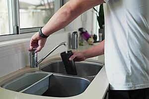 Horny housewife joins cheating threesome with bodybuilder and pornstar. She sucks big cocks and gets cum on her big fake tits.