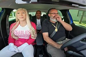 Big tits blonde in car