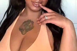 Horny milf slut dances intensely in bikini.