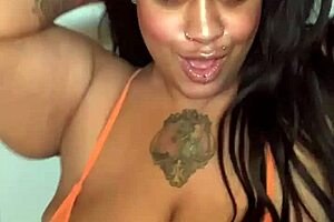 Horny milf slut dances intensely in bikini.