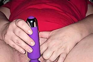 Solo performance of a mature woman with a big pink vagina