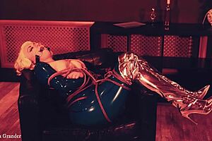 Arya Grander is a latex wearing MILF who enjoys bondage and glamour fetish