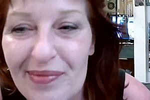 Old redhead flaunts curves and seduces in retro miniskirt