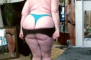 Curvy redhead Dawn flaunts her body and talks dirty! 🔥